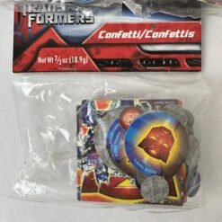Clear plastic bag containing a Transformers-themed confetti pack; red/blue label, assorted confetti pieces inside, net weight 18.9 g.
