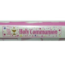 White label on a pink package reading 'Holy Communion' with a gold chalice icon and colorful stars around the text.