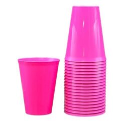 Bright pink disposable plastic cups, with a single cup beside a tall stack of stacked cups