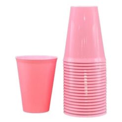 Stack of pink plastic cups with a single pink cup next to them on a white background