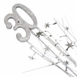 Glittery silver key-shaped wand with star confetti spray, a festive decorative accessory