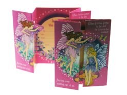 Pop-up greeting card featuring two colorful fairy illustrations on pink and purple panels, with text on the panels about fairies.