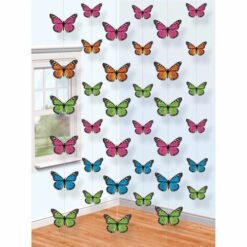 Colorful butterfly ornaments hanging in a sunlit corner of a room as decor.