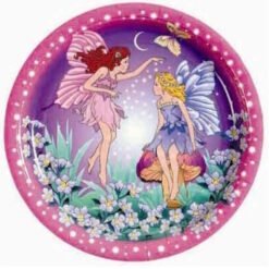Two colorful fairies with wings dance in a meadow of flowers inside a pink circular frame with a moonlit sky above.