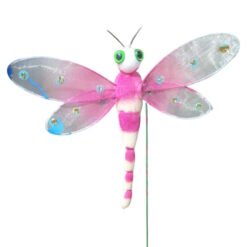 Pink and white dragonfly garden stake decoration with bright green eyes and glittery pink wings.