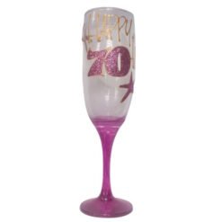 Glittery champagne flute with a pink stem reading 'Happy 70' for a 70th birthday celebration.