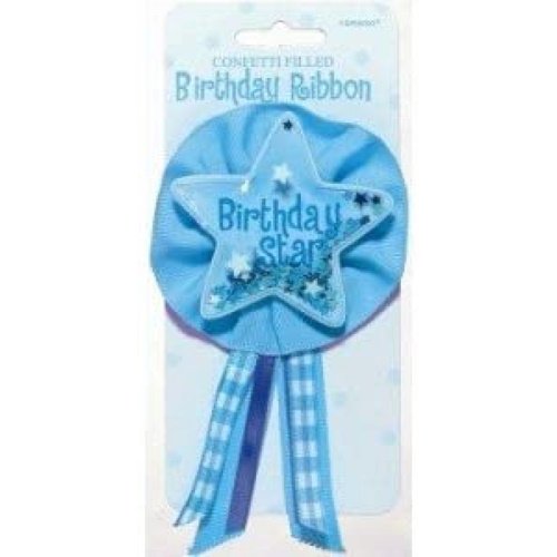 Blue star-shaped birthday ribbon with 'Birthday Star' text, attached to a ruffled blue backing with hanging blue and white ribbons