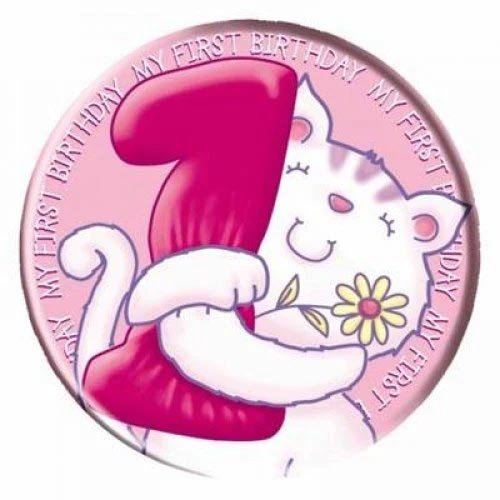 Round pink birthday badge featuring a white cat hugging a large red number 1, with a yellow flower; edge text reads 'My first birthday'