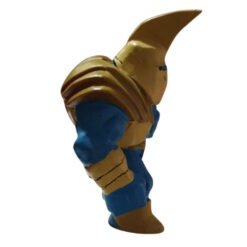Plastic action figure of a blue-armored knight with gold helmet and shoulder plates, shown in a side pose.