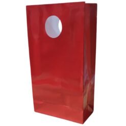 Red glossy gift bag with a circular cutout handle.