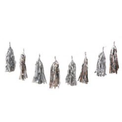 Row of eight tinsel ghost decorations hanging on a line.