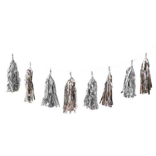 Row of eight tinsel ghost decorations hanging on a line.
