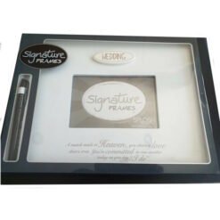Signature Frames wedding album display box with a clear window showing the Signature Frames logo; a 'Wedding' label above the window and a pen mounted on the left side.
