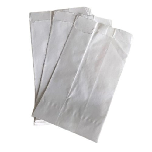Several white padded mailing envelopes stacked together, facing slightly fan-shaped.