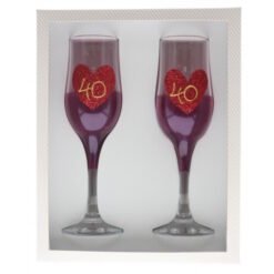 Two stemmed glasses with purple liquid, each a red glitter heart labeled '40' inside.