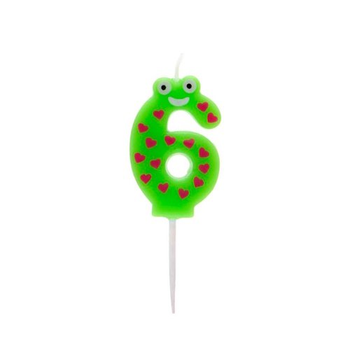 Green number 6 birthday candle with a smiling frog face and red hearts on a white wick