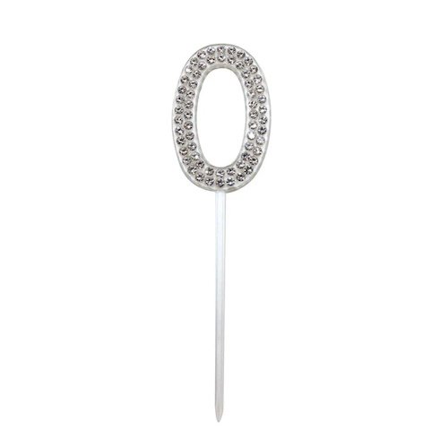 Silver rhinestone-studded number 0 cake topper on a white stick.