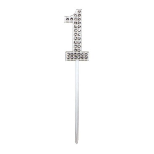 Rhinestone-decorated number 1 birthday candle on a white stick.